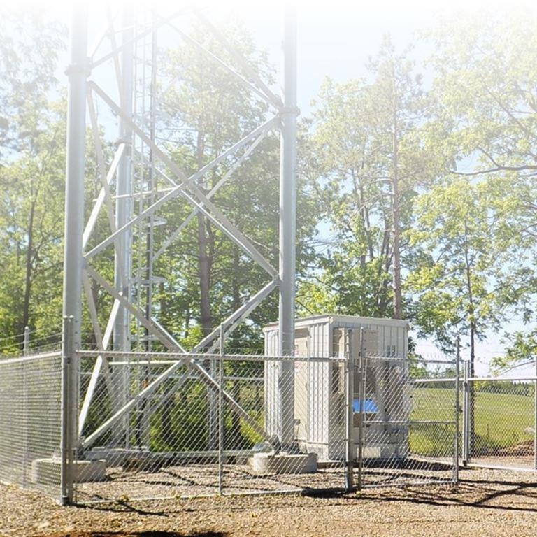 VegClear Rocks and Gravel TVC Total Vegetation Control Application Fenced Lot Industrial Property Overgrown in Georgia