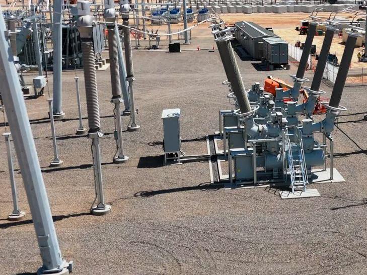 Electrical substation with bare ground vegetation control supporting safe utility operations and equipment access.