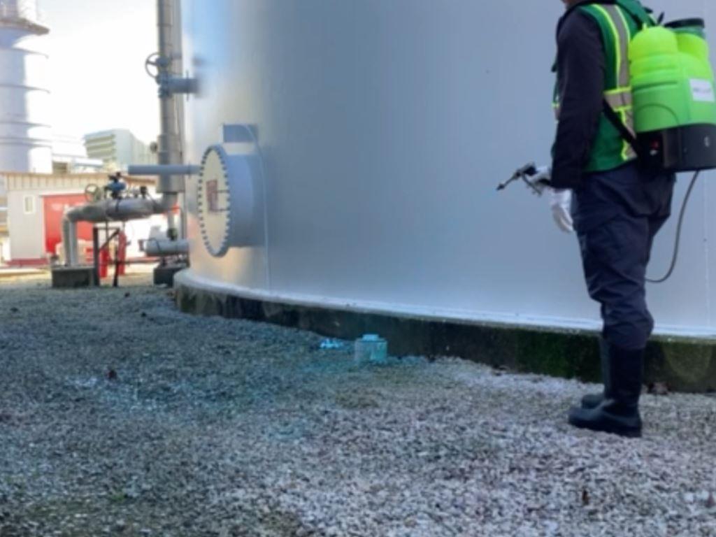 Commercial Weed Control Bare Ground - Technician Applying Herbicides on Energy Sites and Tank Farms