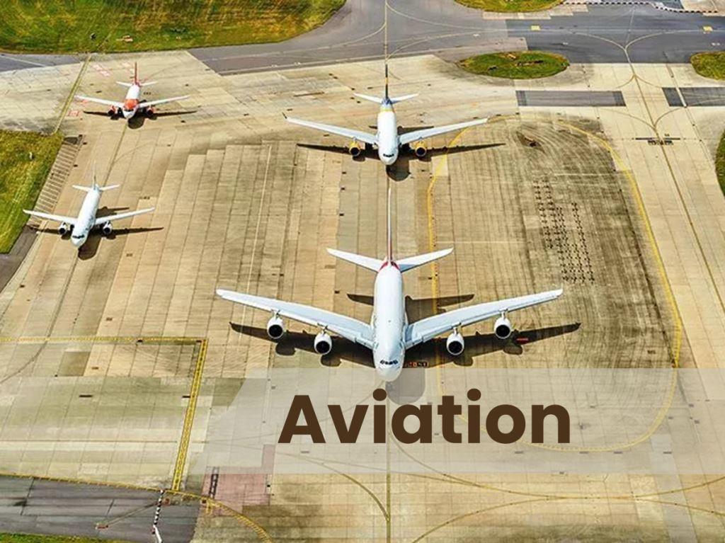 An airport runway with clear surroundings, showcasing precise vegetation control for safety and compliance