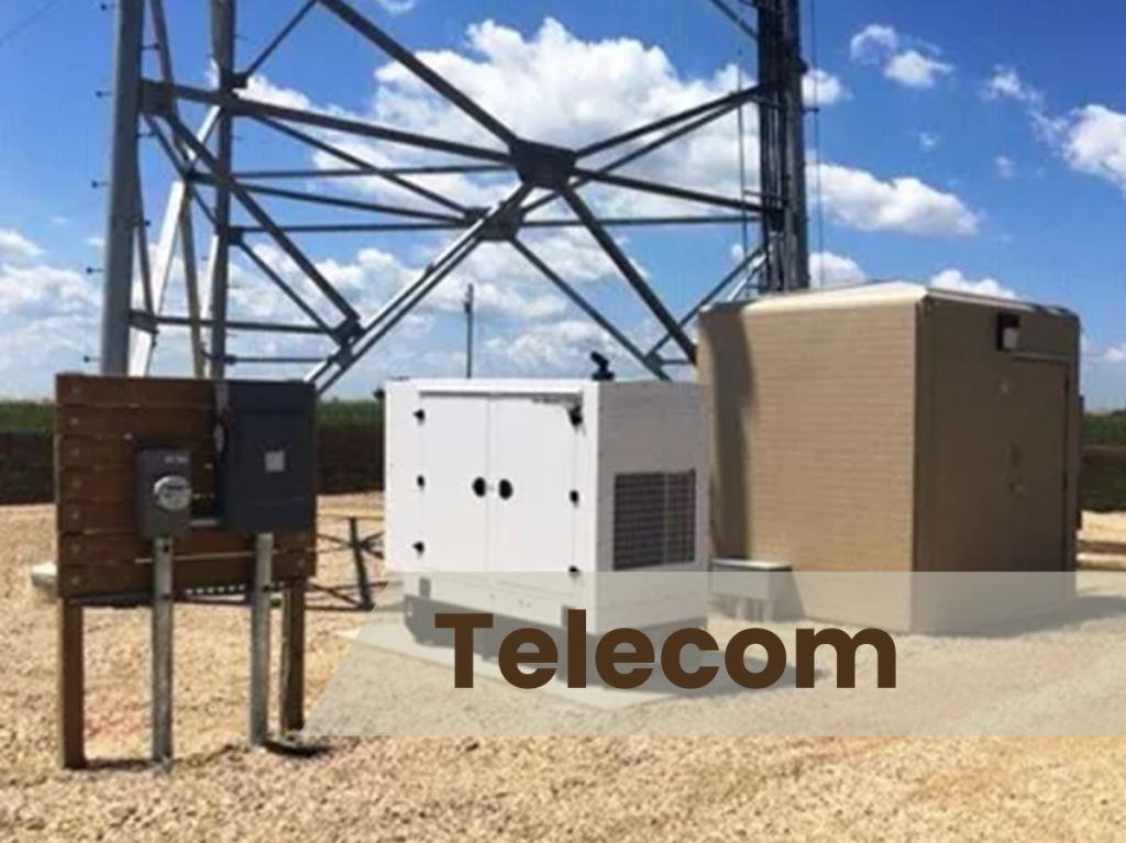 A telecom tower surrounded by clear access roads, illustrating specialized weed control measures in place.