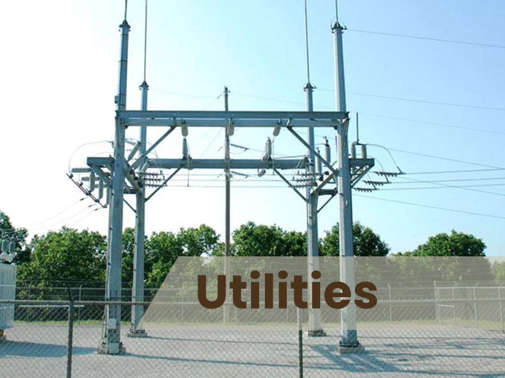 A utility substation with well-maintained vegetation, highlighting effective management of surrounding growth.