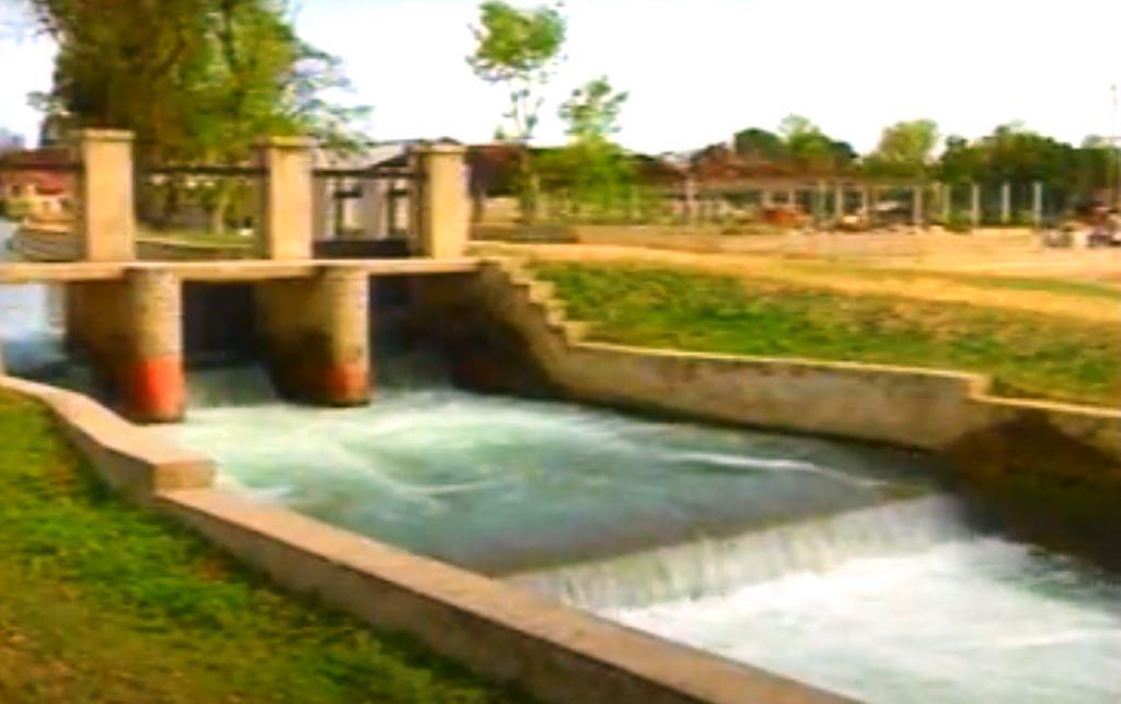 Concrete outlet works and discharge channel used for dam water flow regulation, a key focus of VegClear’s vegetation management for safe dam operation in Georgia.