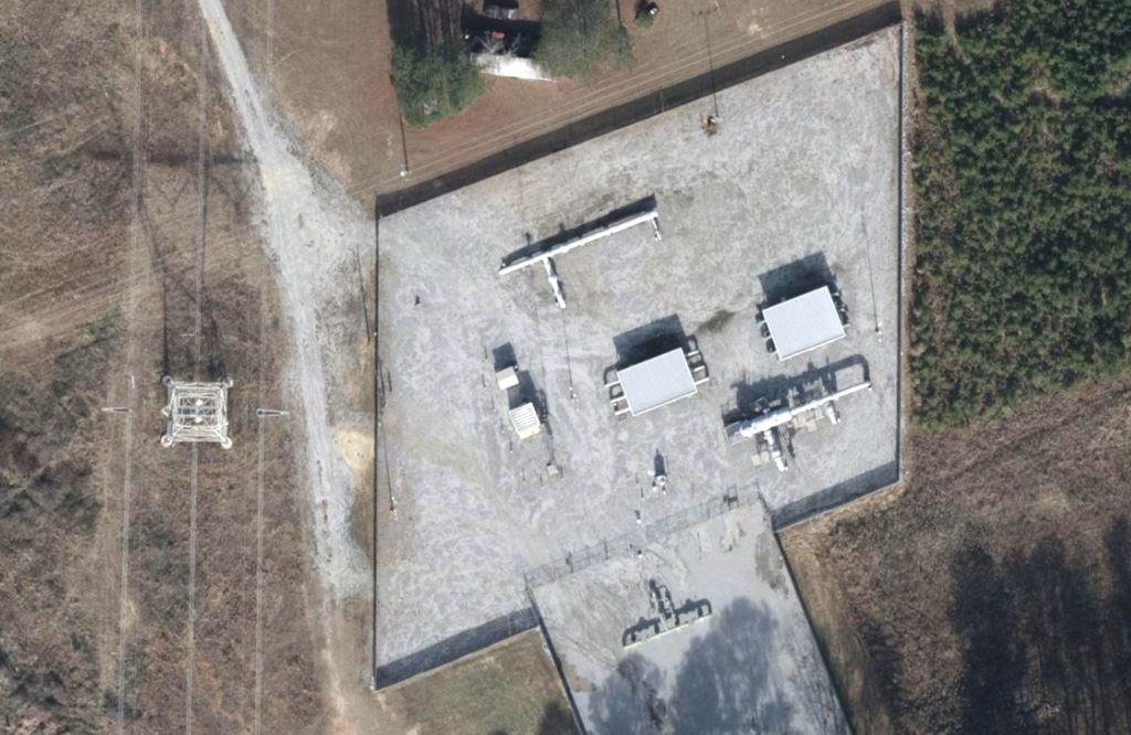 Aerial view of a utility substation and maintenance yard maintained with bare ground herbicide applications, supporting safe access, equipment inspection, and long term industrial vegetation control