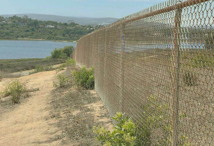 Gravel area in national park treated with herbicides and partner companies including landscapers with oversight by vegclear