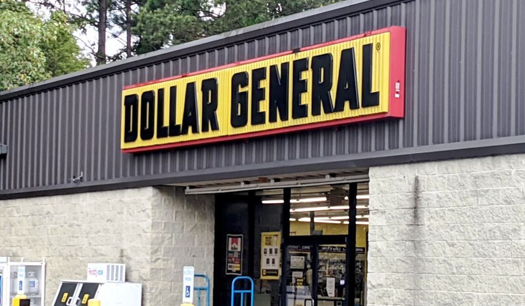 Atlanta Retail Storefront Near Cell Tower Needing Vegetation Management Services on Asphalt