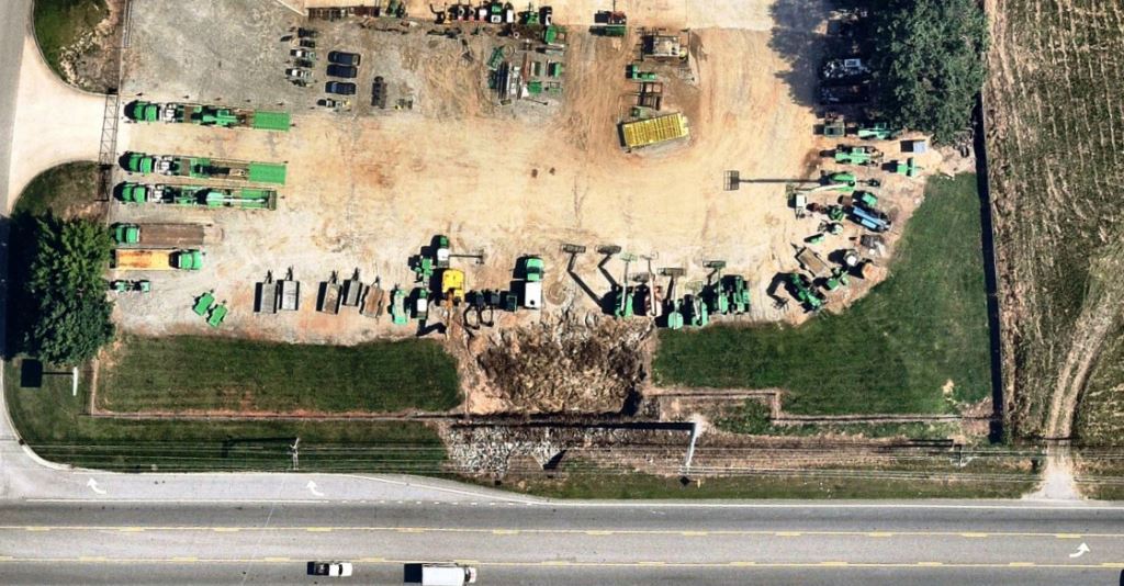Overhead View of Industrial Outdoor Storage Weed Control With Quarterly Bare Ground Herbicide Applications to Fence Lines and Property Perimeters