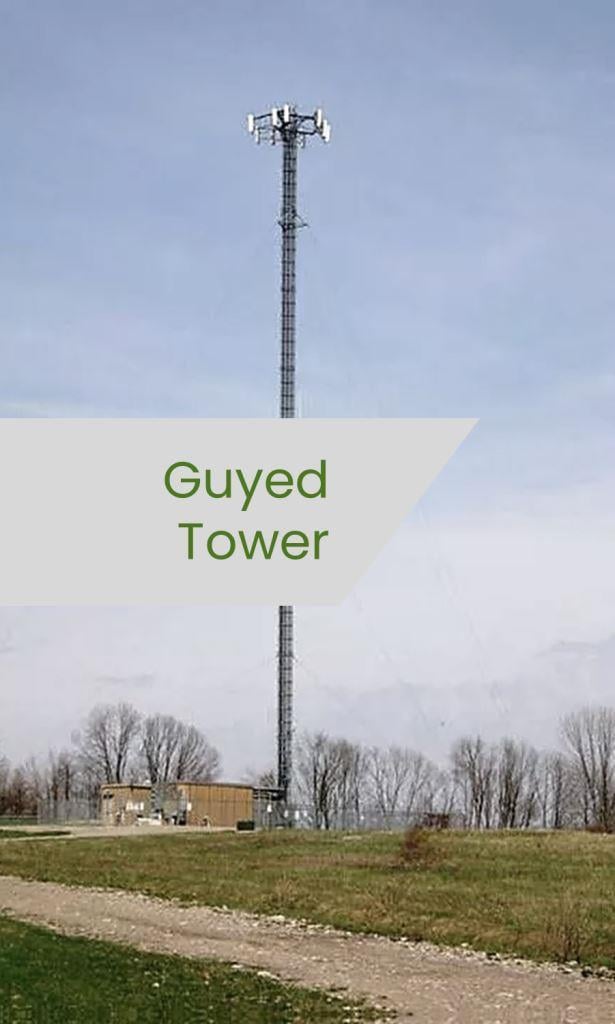 Guyed Tower Rising Above Bare Ground: Cell Site Receiving Routine Vegetation Control Service by Licensed Spraying Technicians to Control Weeds on Gravel and Fence Lines