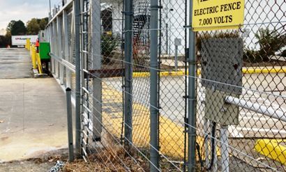 Industrial vegetation management by VegClear ensures electric fence perimeter upkeep