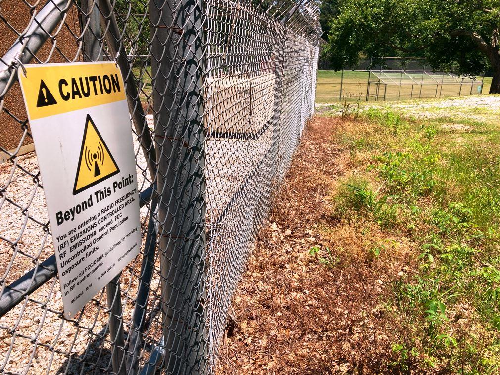 Industrial Property Cell Site Vegetation Management: Tower Base Weed Control Achieved Through Industrial Grade Herbicide Applications by Professional Spraying Company VegClear in Atlanta Georgia Using Post-Emergent