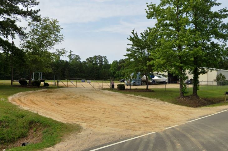 Bare Ground Gravel Entrance After Vegetation Removal for Government and Commercial Sites in Georgia