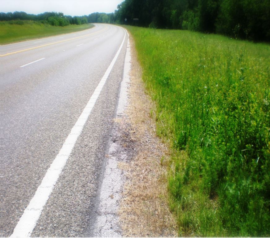 Single stretch of Industrial roadway or 50 Miles of right of way