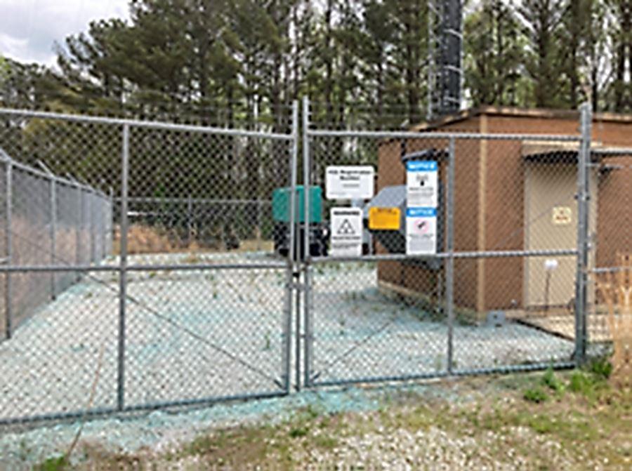 VegClear Rocks and Gravel TVC Total Vegetation Control Application Fenced Lot Industrial Property Overgrown in Georgia