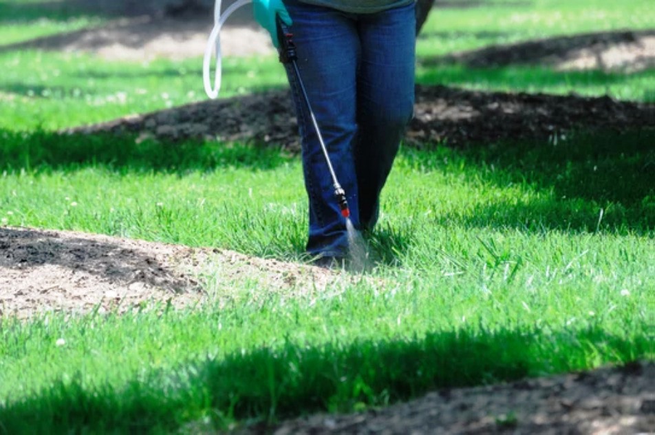 VegClear using liquid herbicides forming a barrier in mulch and soil where most seeds germinate preventing their development