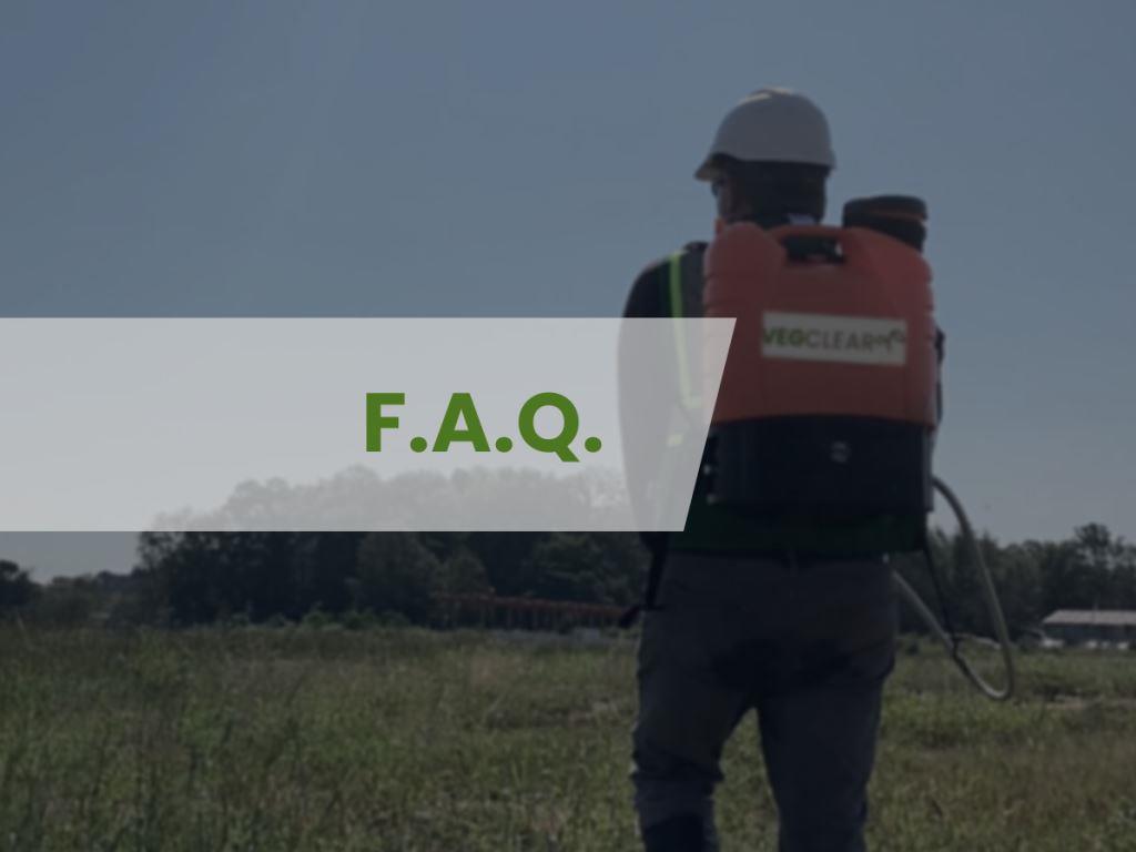 Field technician with backpack sprayer applying industrial weed control, illustrating VegClear’s FAQ section on vegetation management, compliance, treatment frequency, and service programs.