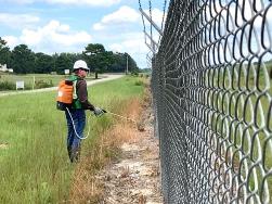 VegClear tackles fence line vegetation with industrial herbicides for commercial properties