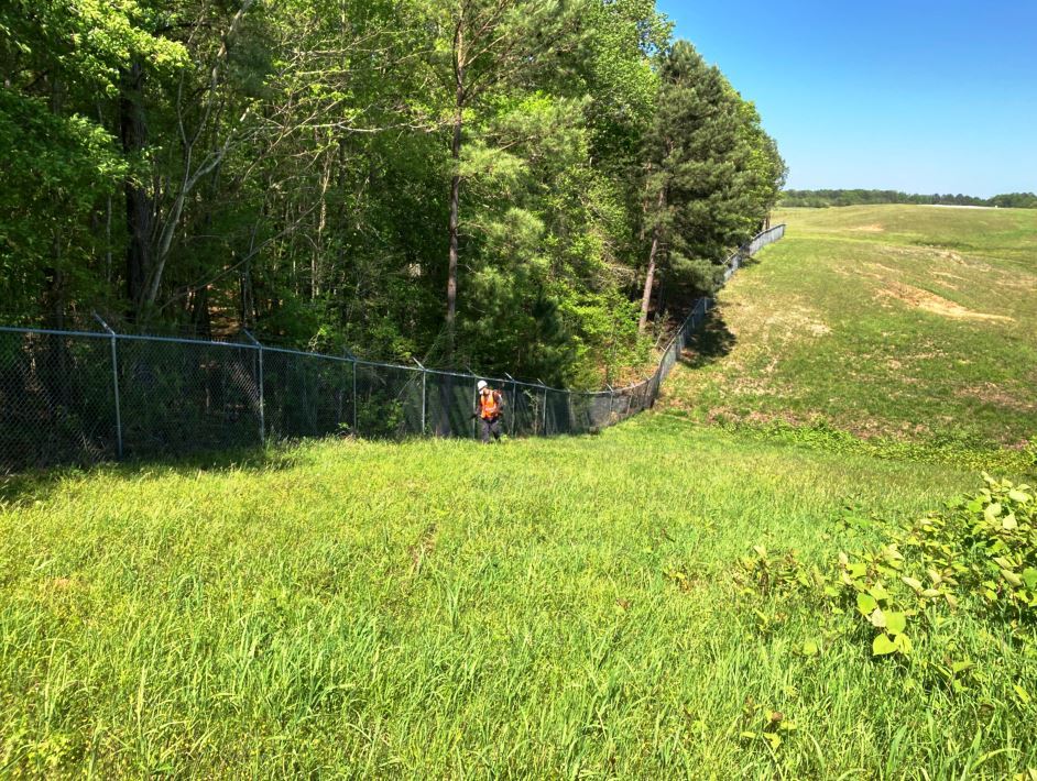 Division Manager Spraying Total Vegetation Control on Airport Fence Linein Georgia