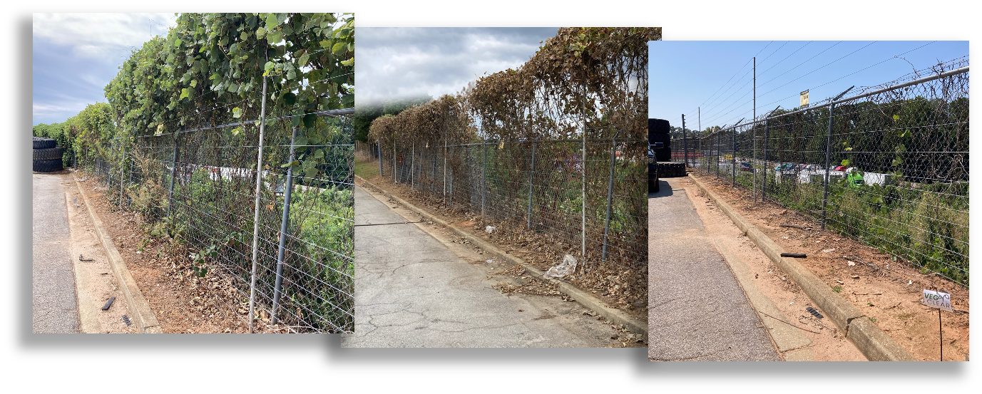 Gravel truck court fence line with controlled vegetation and clear perimeter access along industrial boundary zone