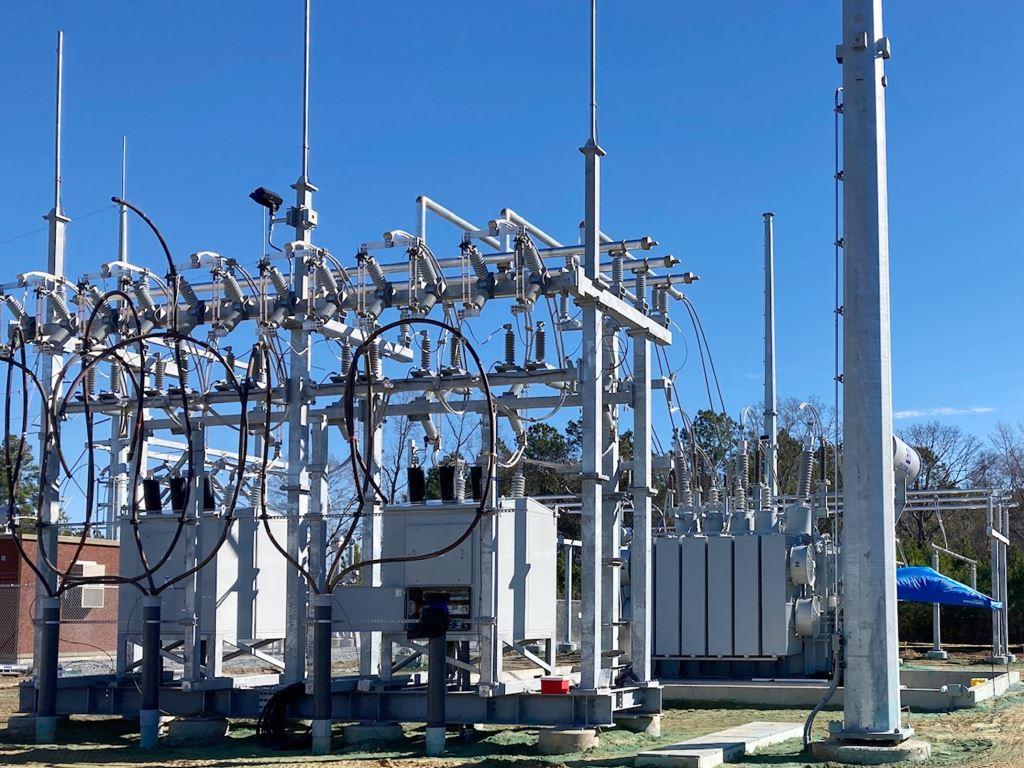 Client utility site in Georgia with bare ground conditions around transformers and equipment, ensuring compliance, safety, and vegetation-free operational zones.
