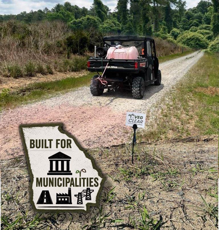 ATV mounted industrial herbicide spray rig applying gravel road vegetation control for municipal and industrial infrastructure maintenance in Georgia, supporting long term access, bare ground management, and perimeter weed control.